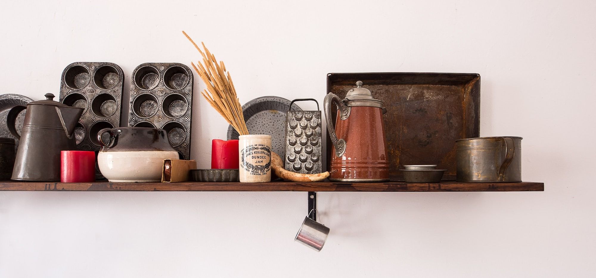 kitchen utensil lot on brown wooden floating shelf - best acne treatments you can do at home