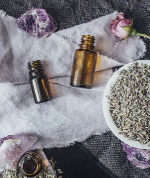 a table topped with bottles of essential oils