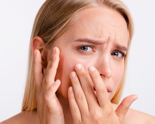 sensitive skin close-up-worried-woman-with-white-background_23-2148313333 - Alpha Hydroxy Acid Skincare