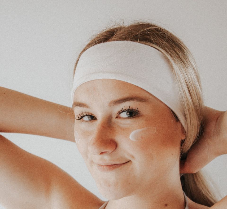 Acne-Prone Skin - smiling young girl with towel wrap