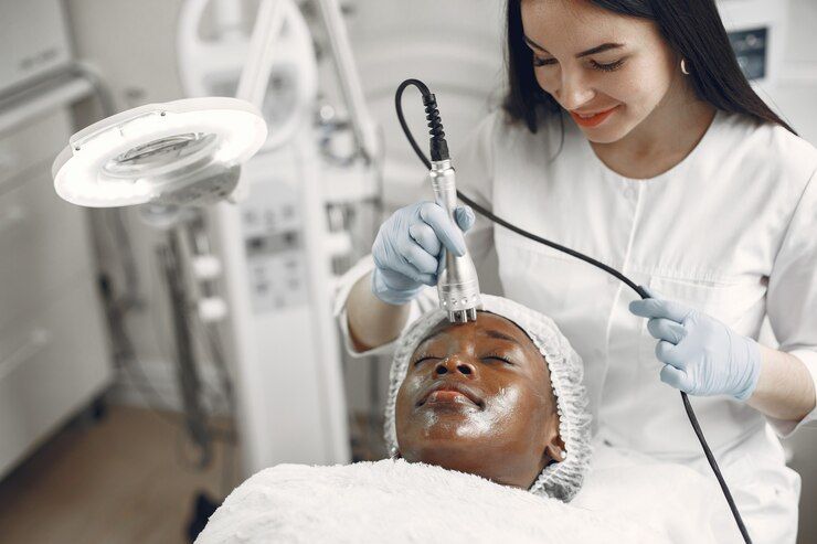 African-American lady beautician treatment