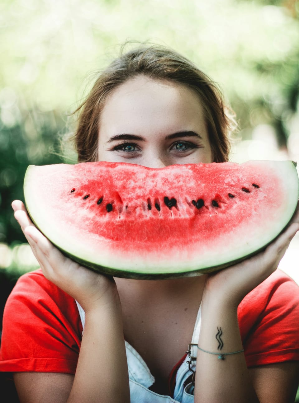 Fruit Facial Kits  - girl with watermelon held up against her face